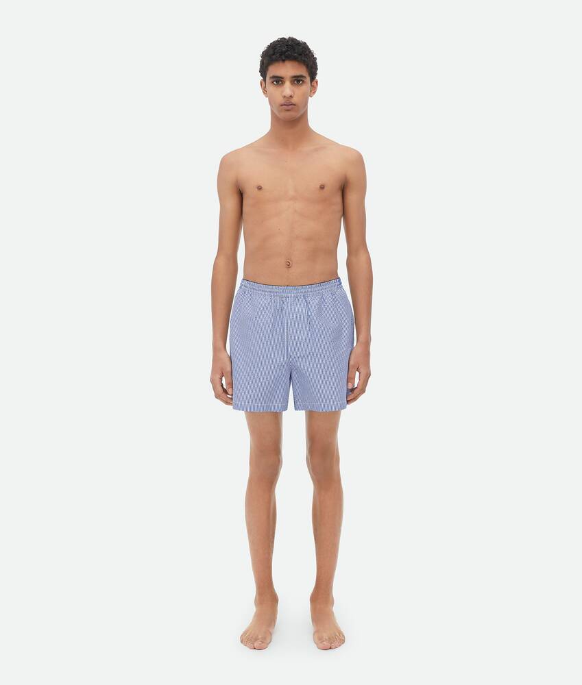 Bottega Veneta® Men's Nylon Swim Shorts in Blue / White. Shop