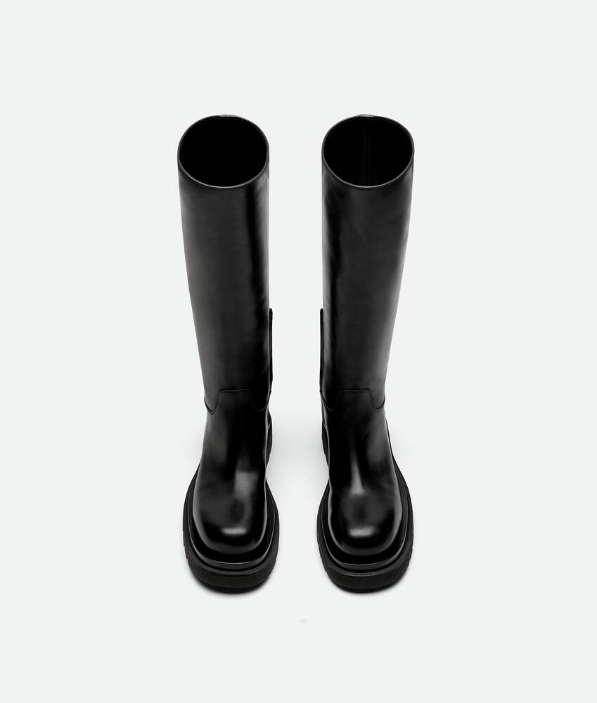 Bottega Veneta® Women's Lug Boot in Black. Shop online now.