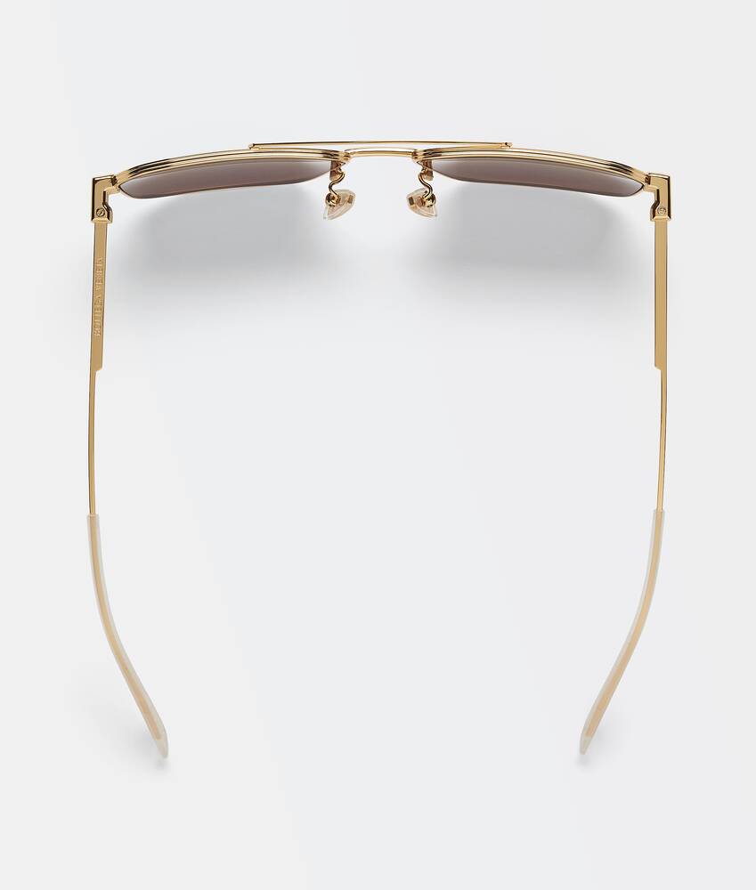 Bottega Bond Metal Aviator Sunglasses in Gold. Shop online now.
