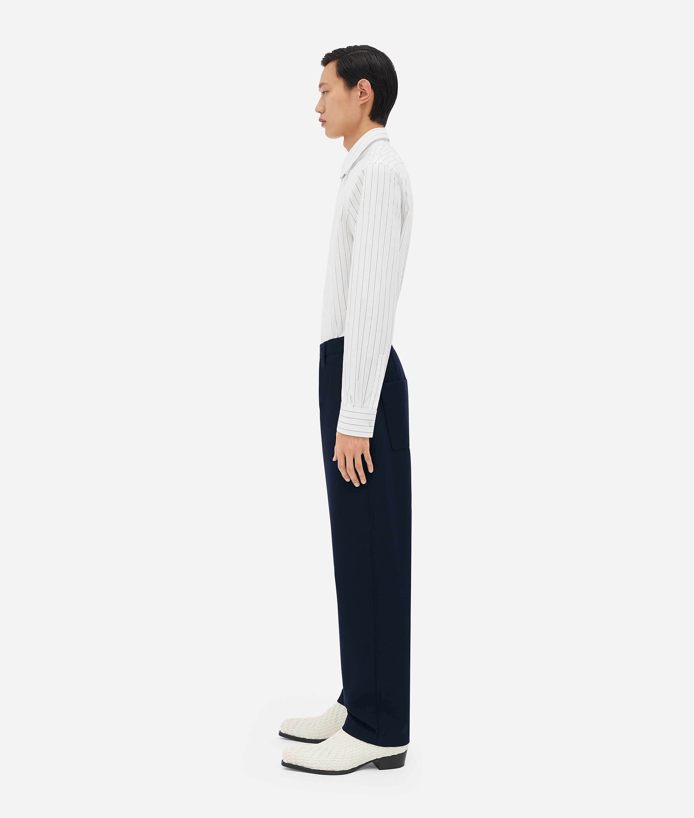 Shop Bottega Veneta Bonded Wool And Cotton Tapered Trousers In Blue