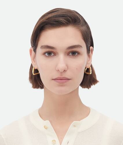 Bottega Veneta® Women's Triangle Hoop Earrings in Silver. Shop online now.