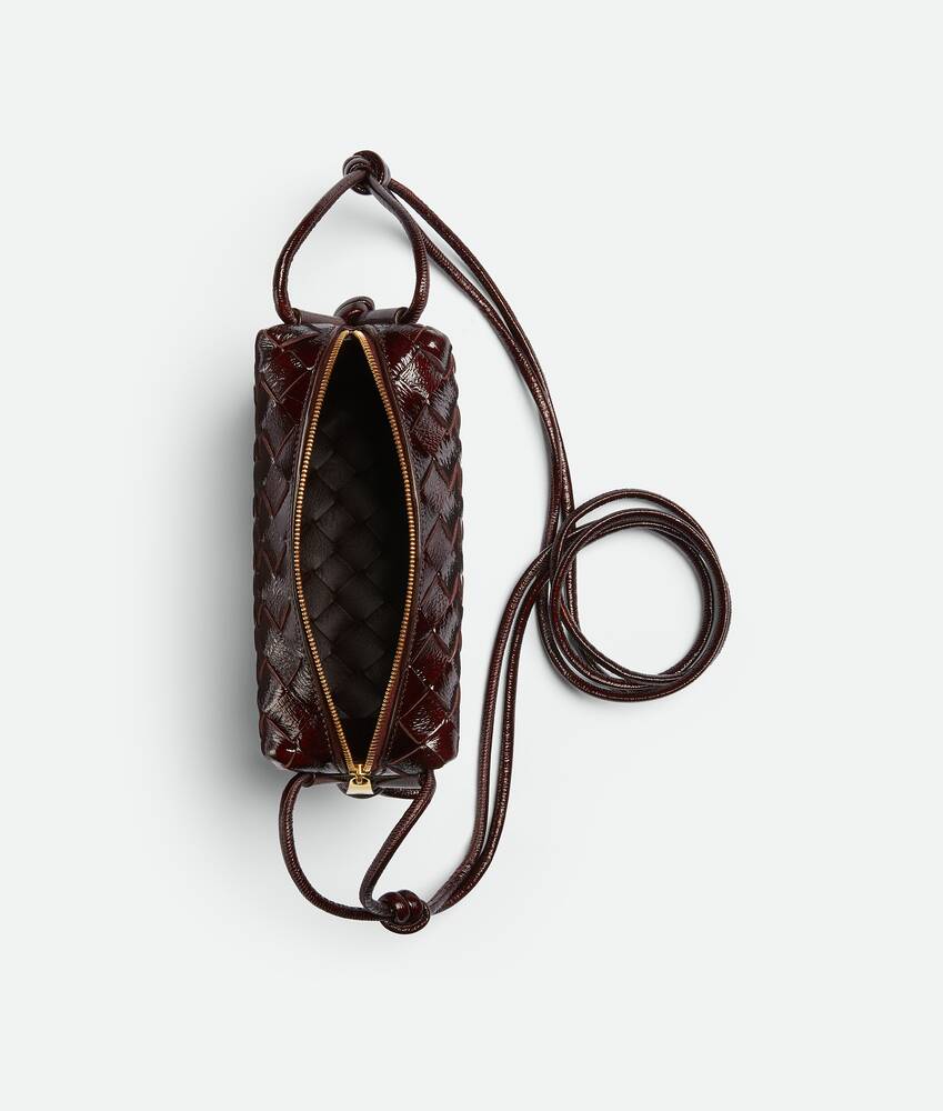Bottega Veneta® Mini Loop Camera Bag in Wine. Shop online now.