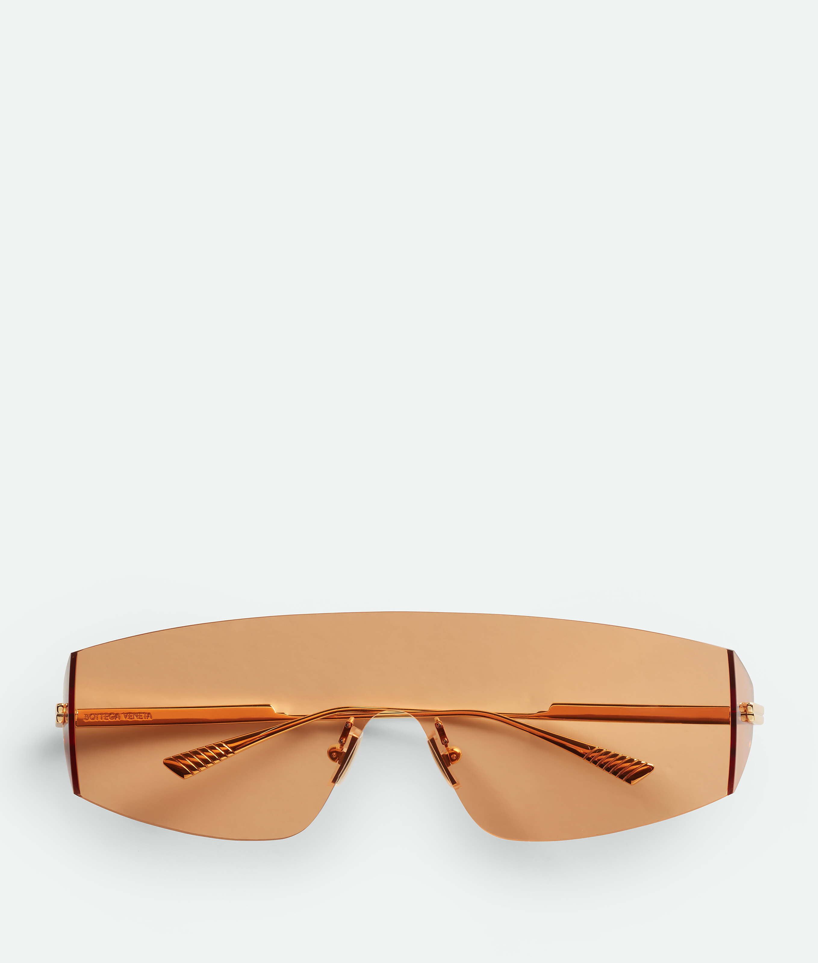 Bottega Veneta Futuristic Shield Sonnenbrille In Gold/orange