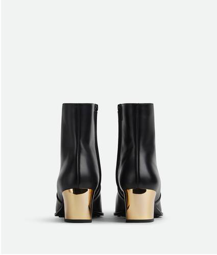 Bottes de luxe femme - Bottes Tire Bottega Venetta en cuir noir et semelle  rose