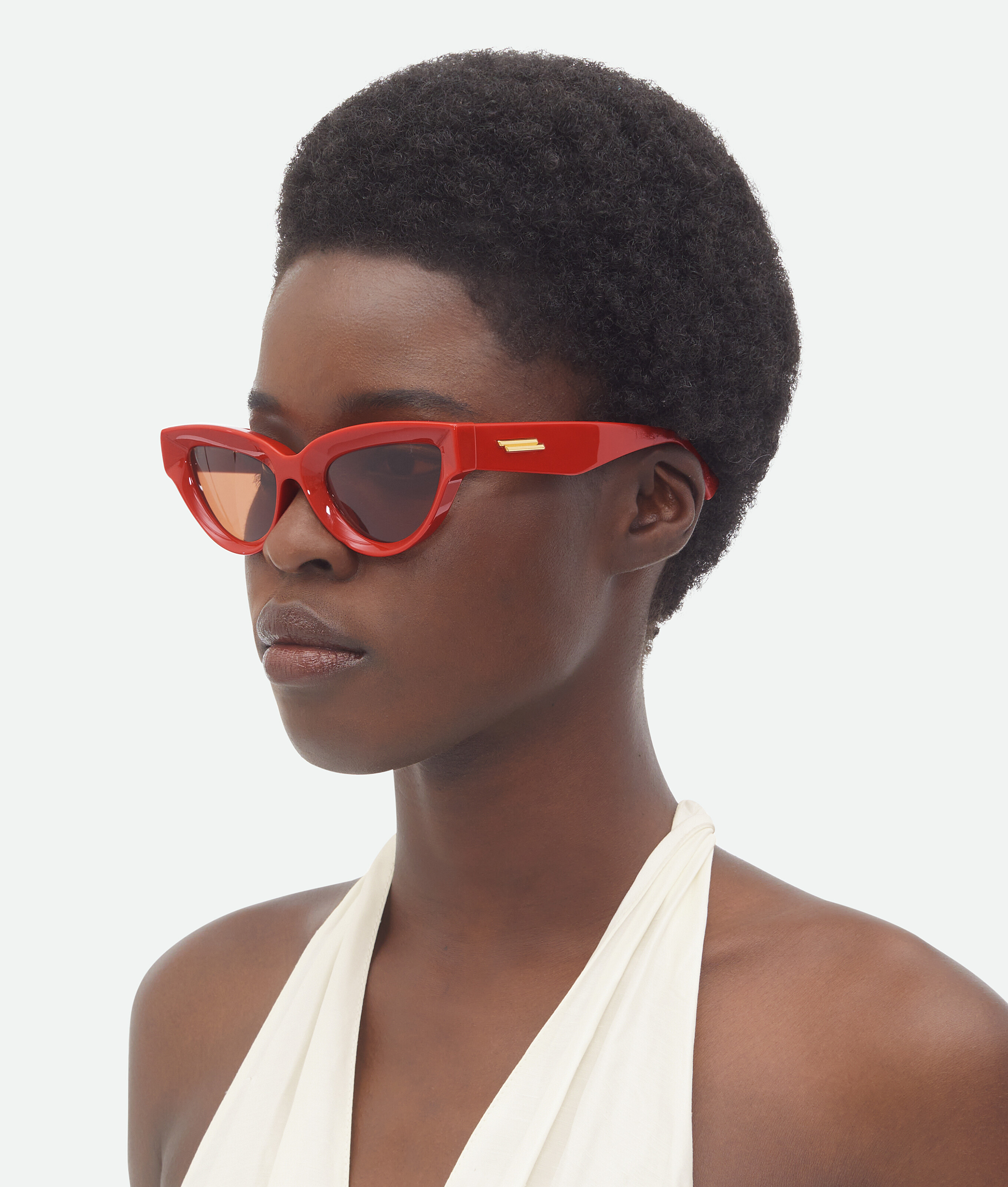 Shop Bottega Veneta Sharp Cat Eye Sunglasses In Orange