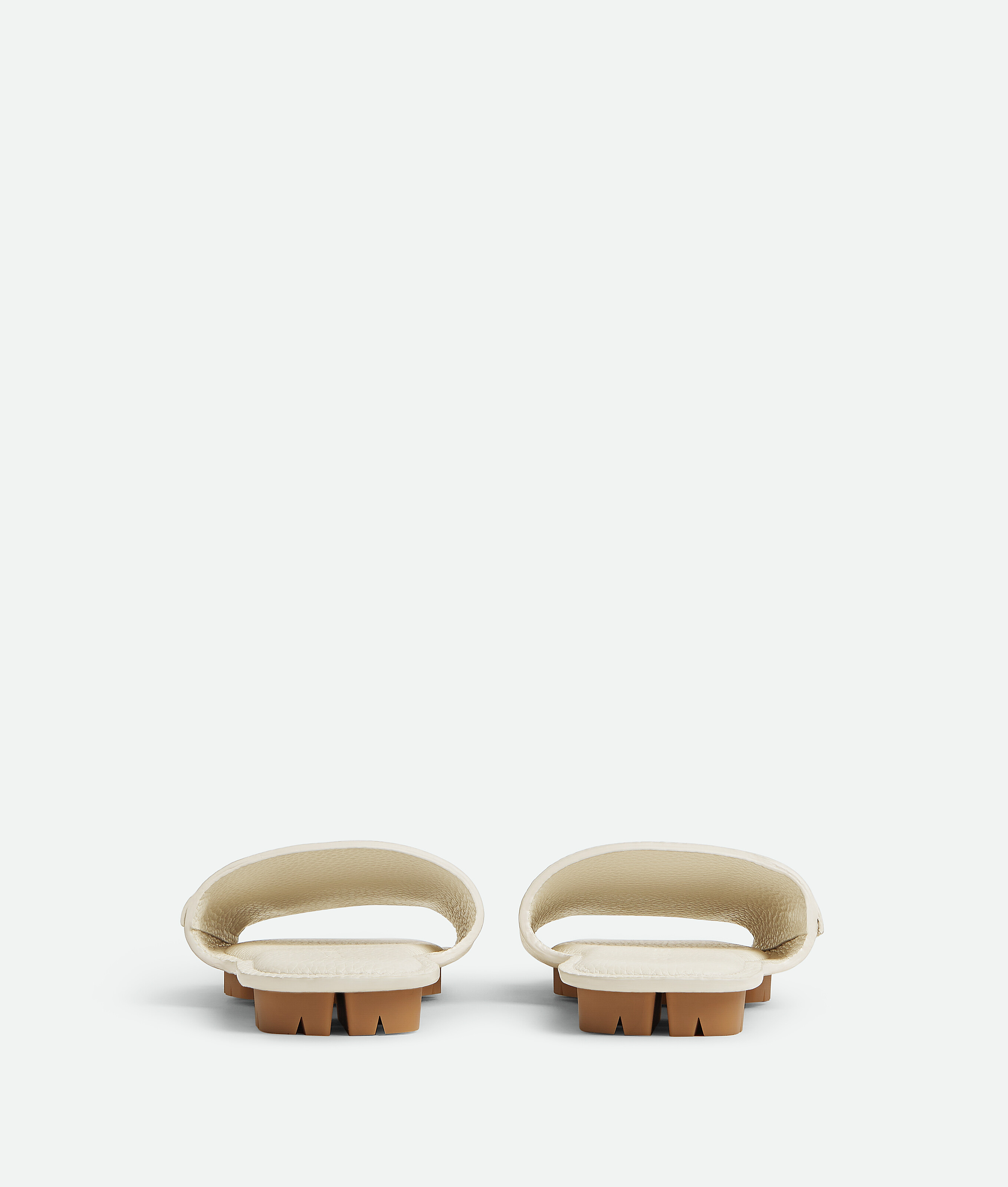 Shop Bottega Veneta Shore Mules In String