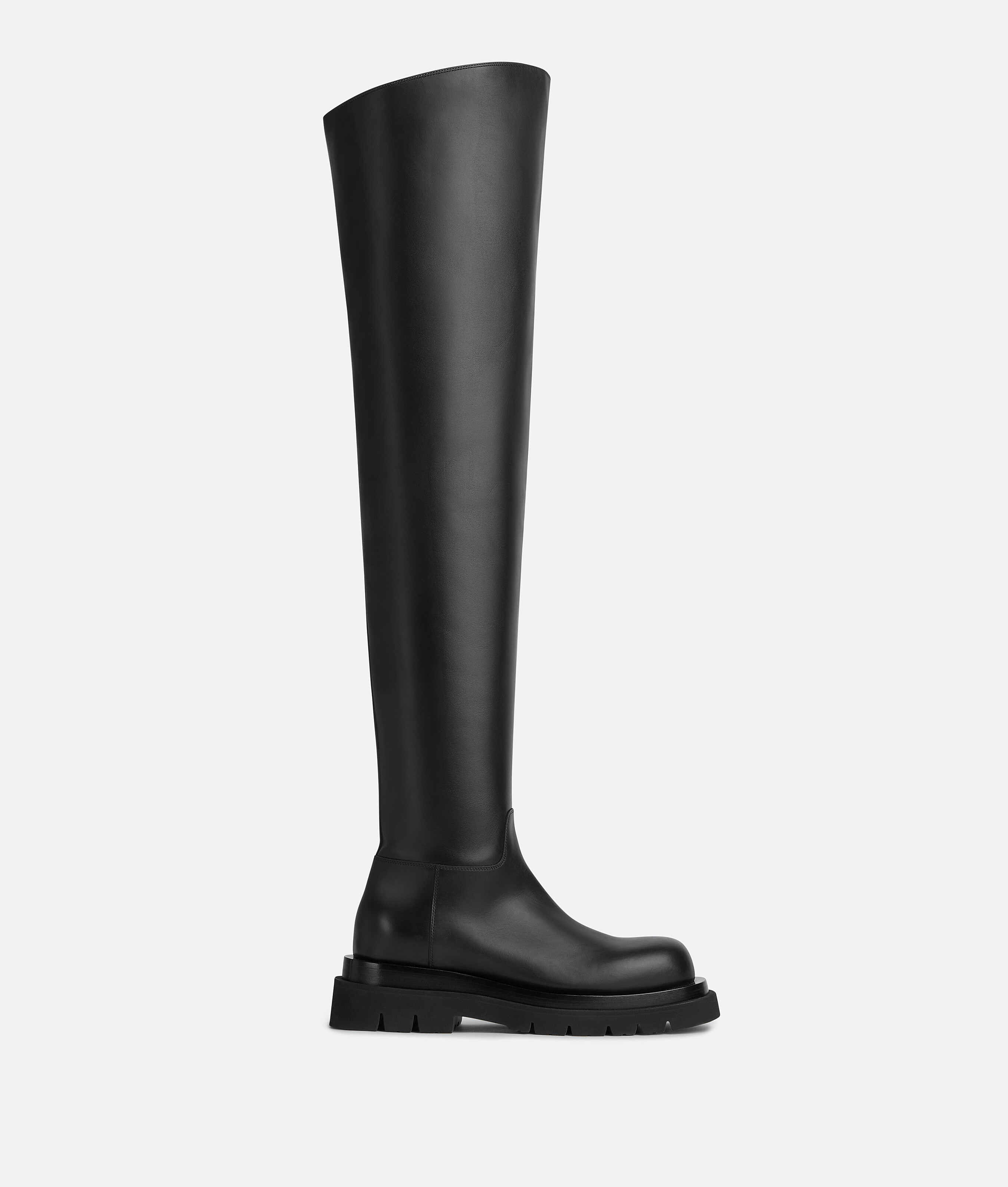 Bottega Veneta® Women's Lug Over-The-Knee Boot in Black. Shop