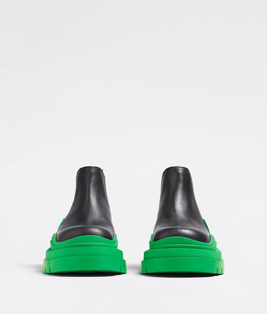 Bottega Veneta® Men's Tire Chelsea Boot in Black / Grass. Shop online now.