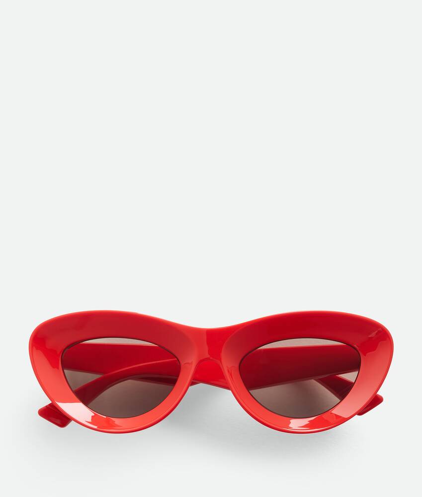 Bottega Veneta Sharp Cat Eye Sunglasses in Red grey. Shop online now