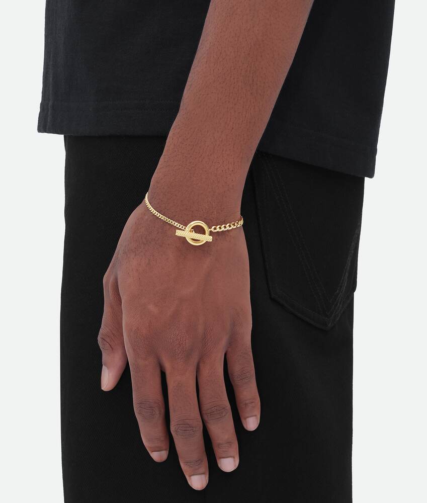 Bottega Veneta® Men's Intreccio Bracelet in Yellow Gold. Shop online now.