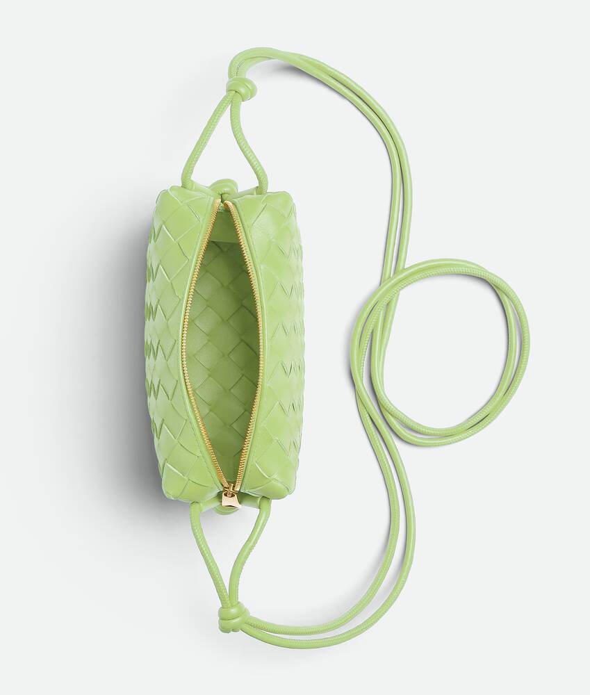 Bottega Veneta® Women's Mini Loop Camera Bag in Fennel. Shop
