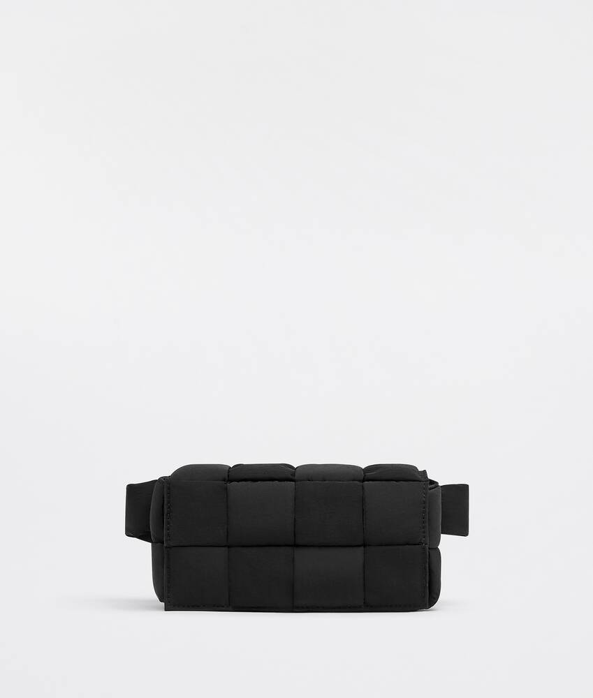 Bottega Veneta® Padded Tech Cassette Belt Bag in Black. Shop