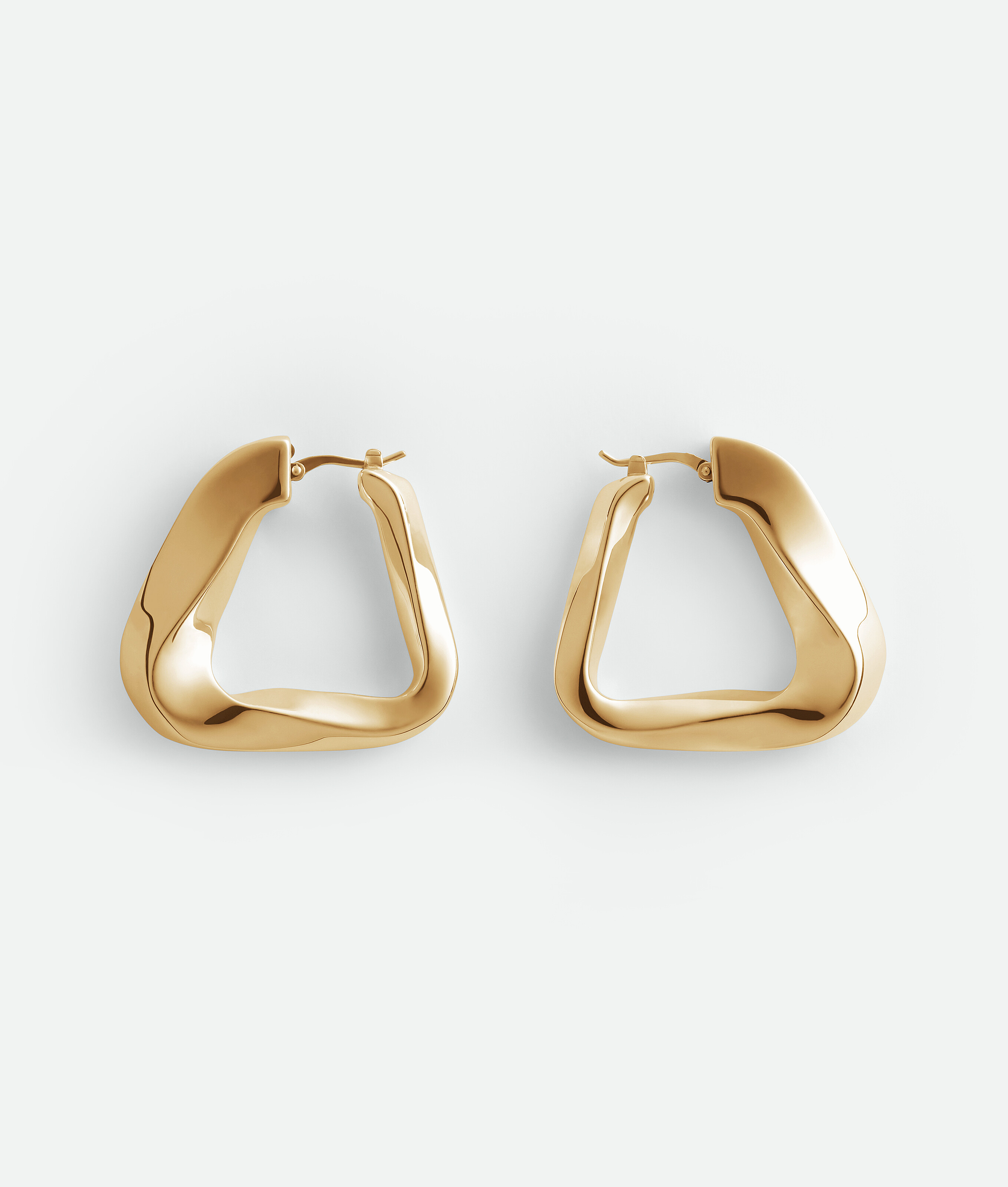 Shop Bottega Veneta Large Twist Triangle Hoop Earrings In Gold