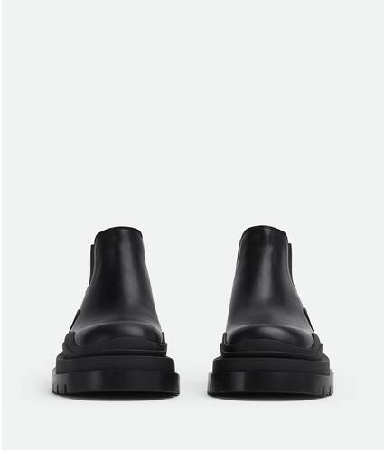 Bottega Veneta® Women's Tire Ankle Chelsea Boot in Black. Shop online now.