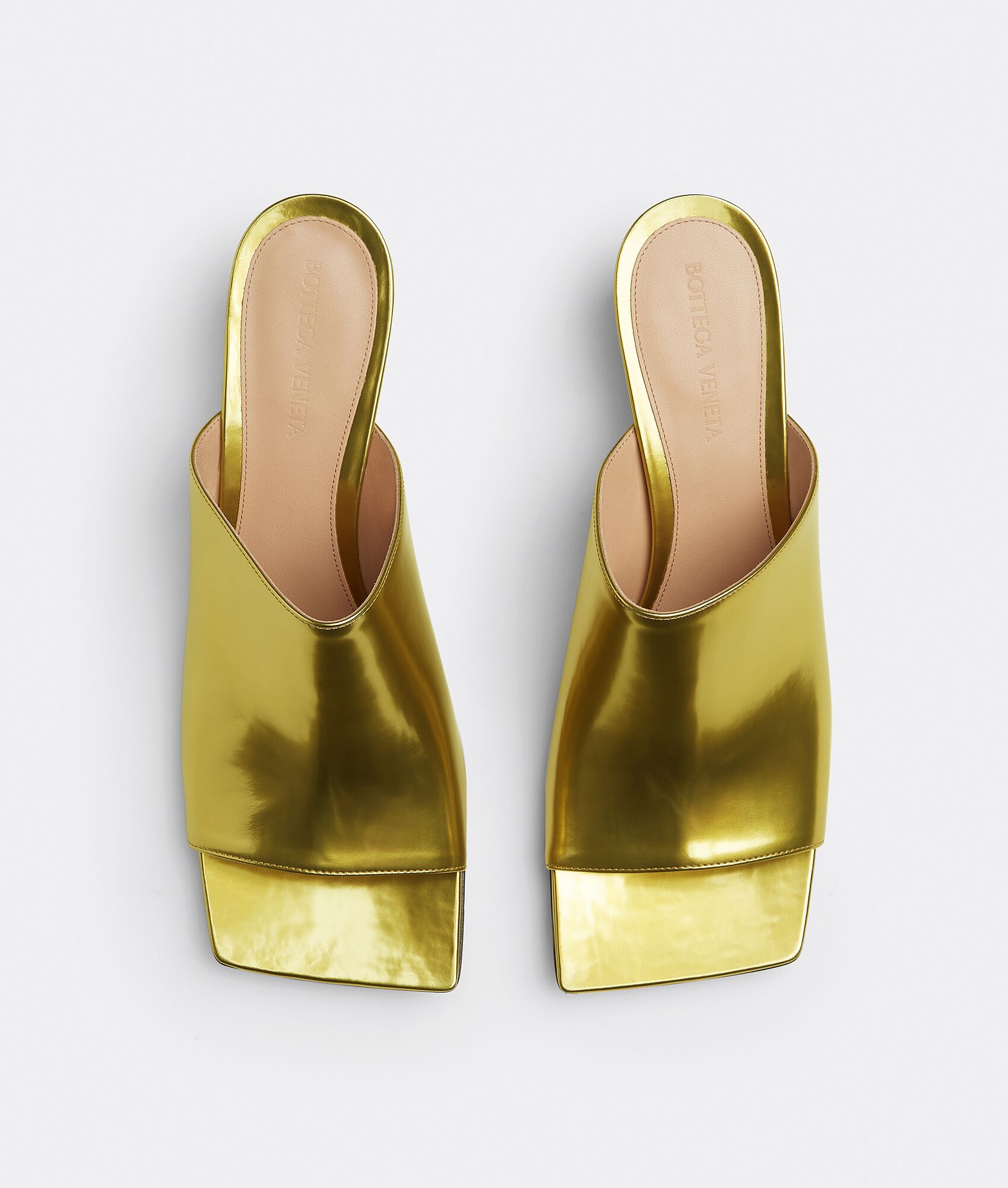 Bottega Veneta® Women's Stretch Mule in Gold. Shop online now.