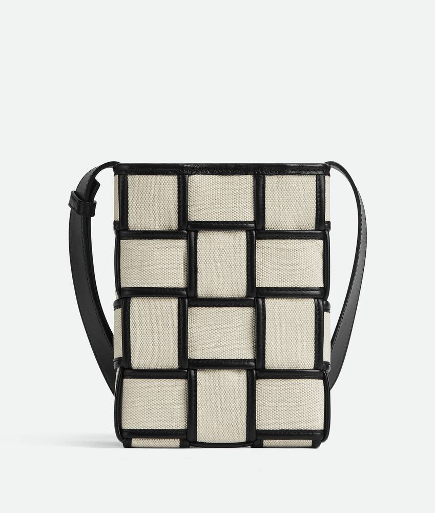 Bottega Veneta® Men's Mini Cassette Cross-Body Bag in Natural / Black. Shop  online now.