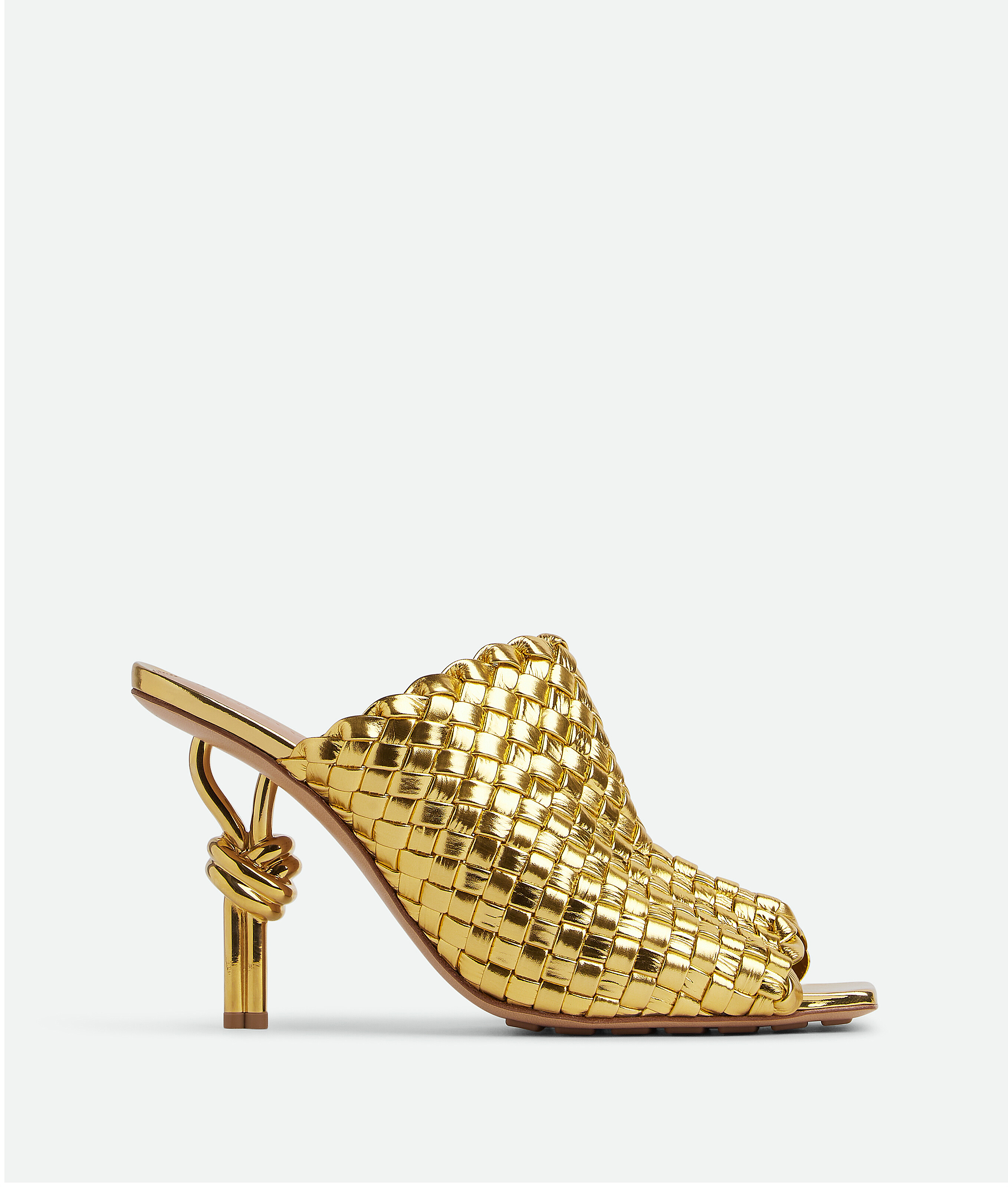Shop Bottega Veneta Knot Mules In Gold