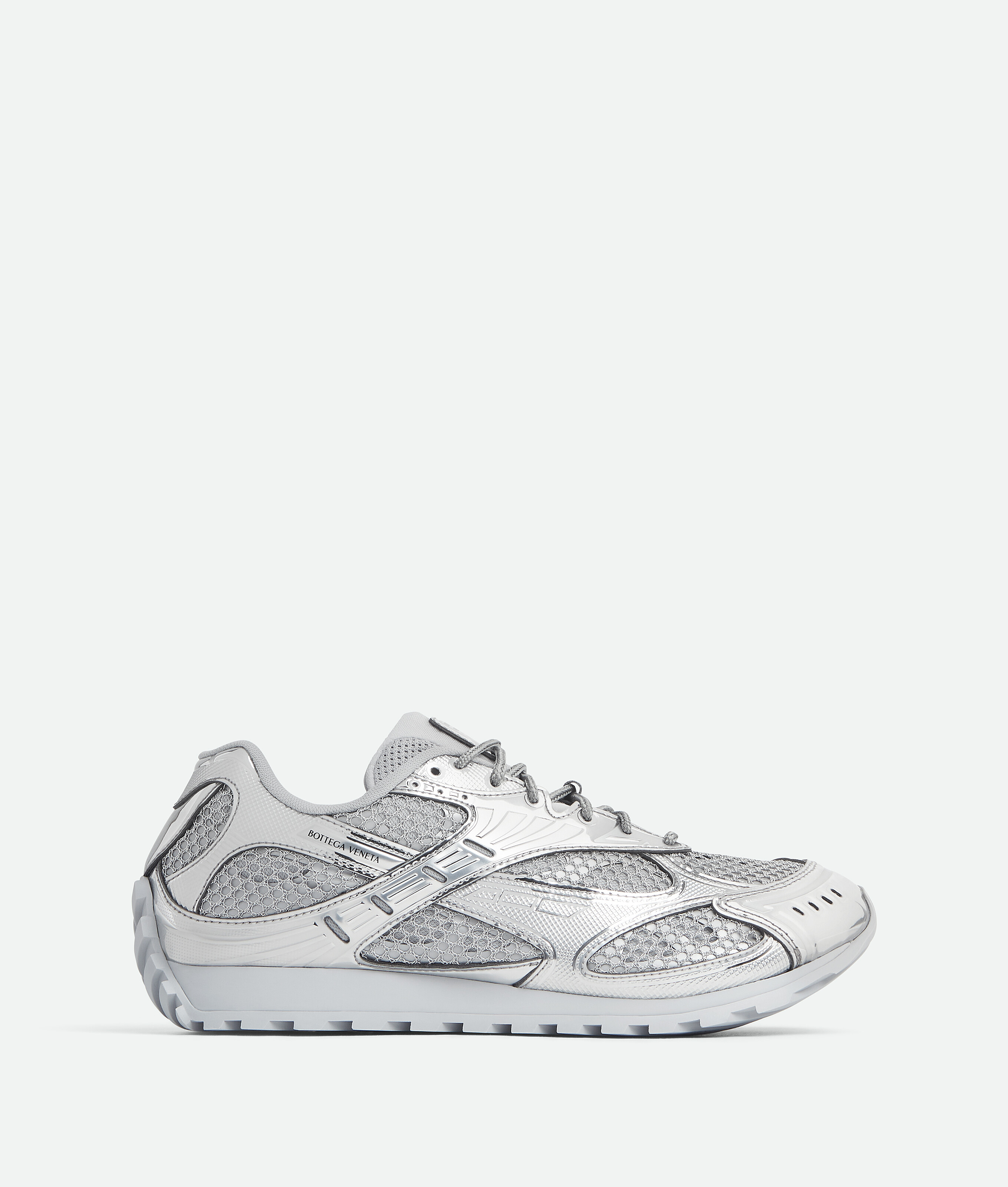 Bottega Veneta® Women's Orbit Sneaker in Silver. Shop online now.